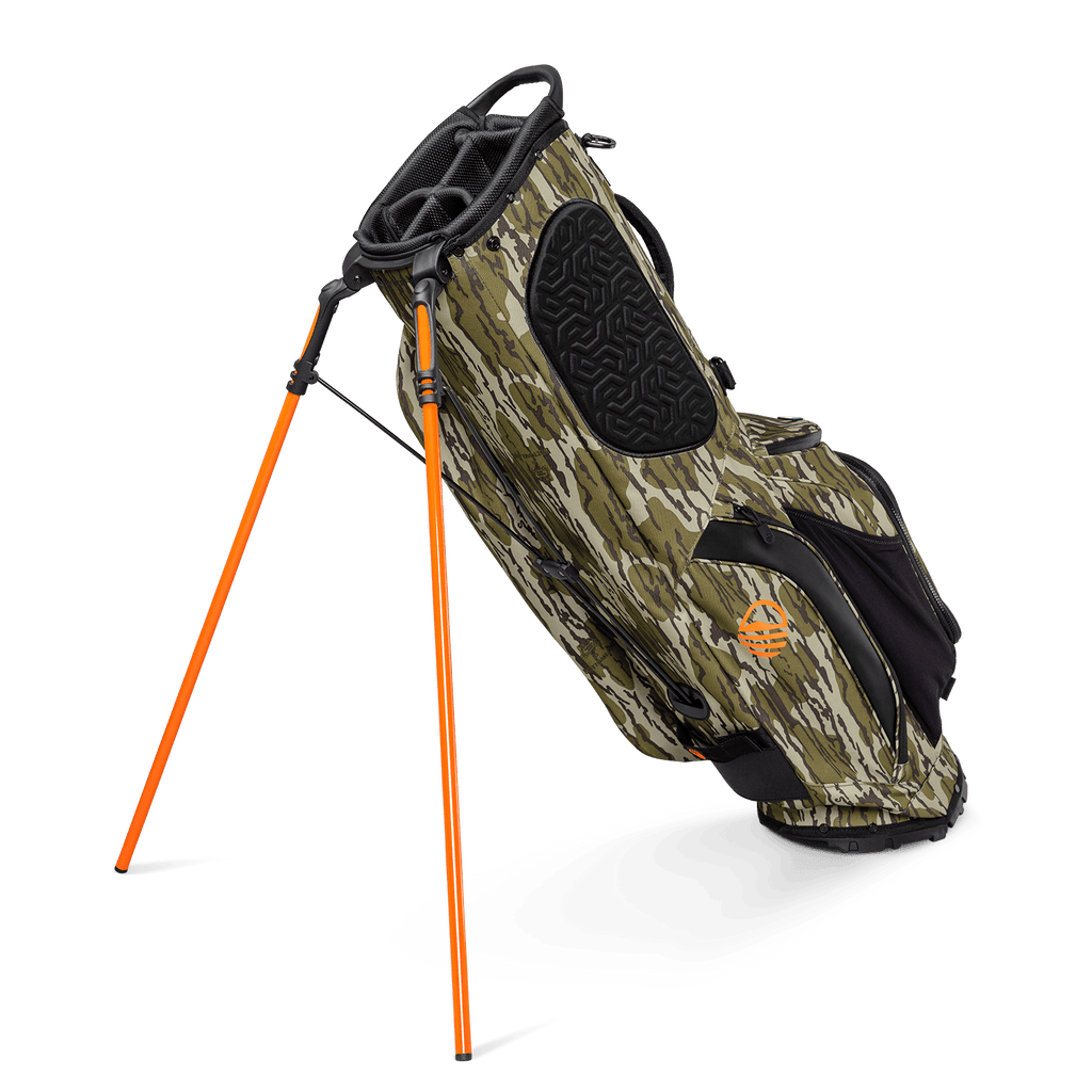 A full shot of standing Ryder golf bag in mossy oak bottomland facing backward