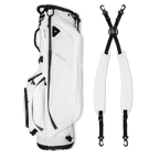 A full shot of Ryder S-Class golf bag in white vegan leather laying flat sideways beside its double strap