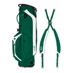 A full shot of Ryder golf bag in evergreen laying flat sideways beside its double strap
