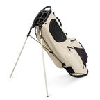 A full shot of standing Ryder S-Class golf bag in cream vegan leather facing backward