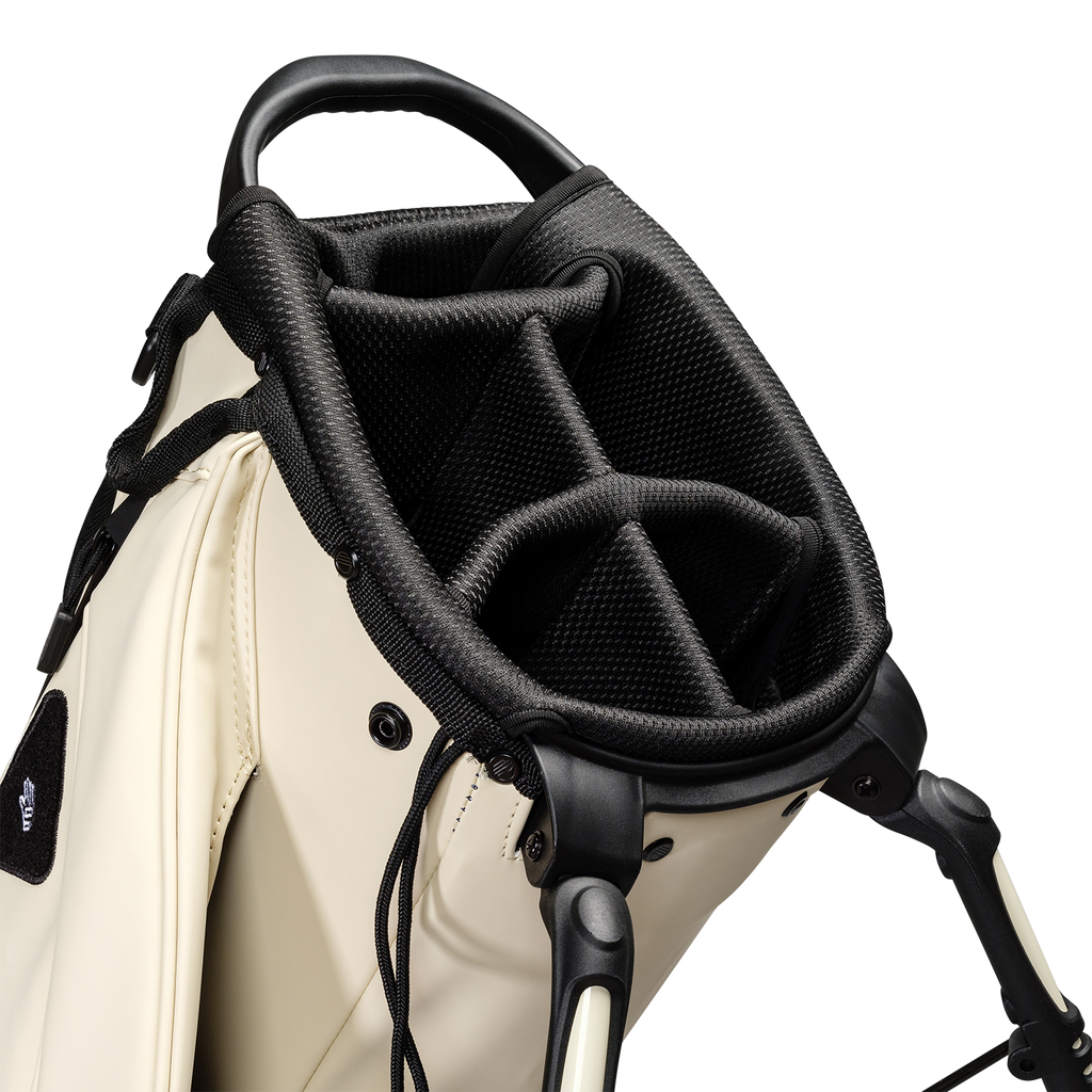 A close up top view of a cream vegan leather Ryder S-Class golf bag’s 5-way divider