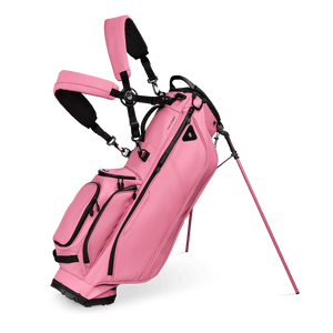 A full front shot of standing Ryder S-Class golf bag in dusty pink vegan leather with double strap