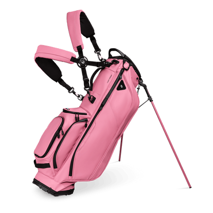 A full front shot of standing Ryder S-Class golf bag in dusty pink vegan leather with double strap