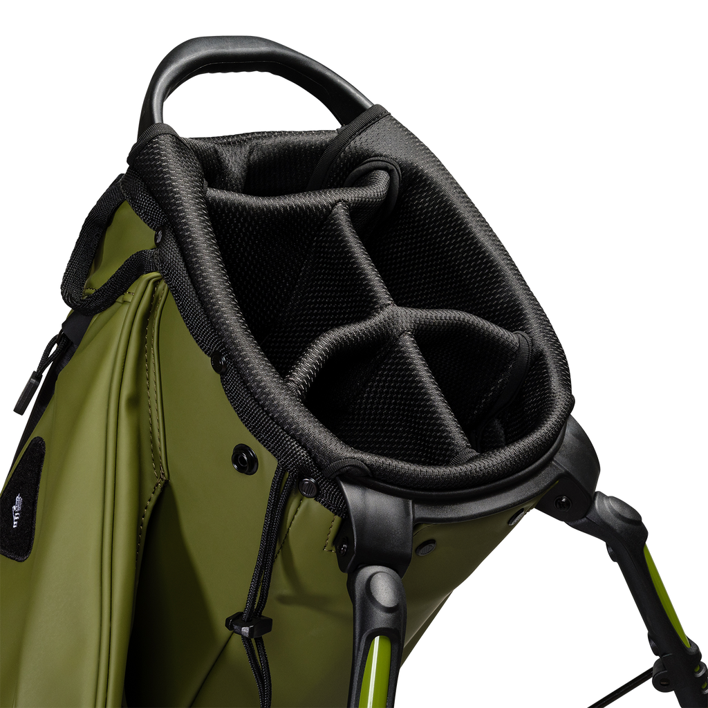 A close up top view of a olive vegan leather Ryder S-Class golf bag’s 5-way divider