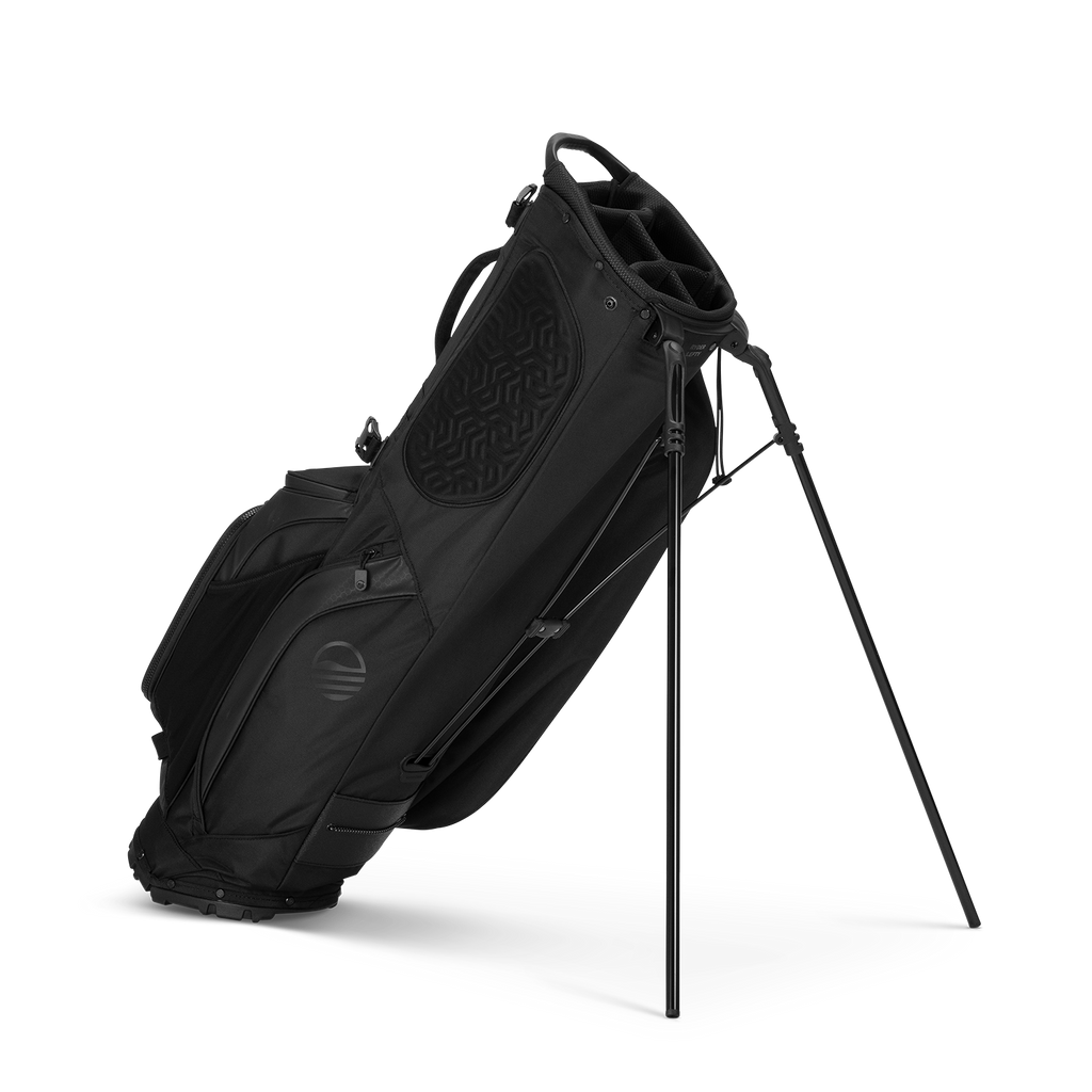 Black golf bag with stand on a white background