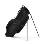 Black golf bag with stand on a white background