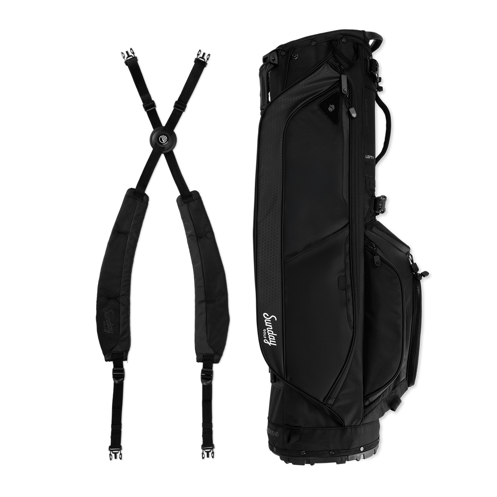 Black golf bag with straps on a white background
