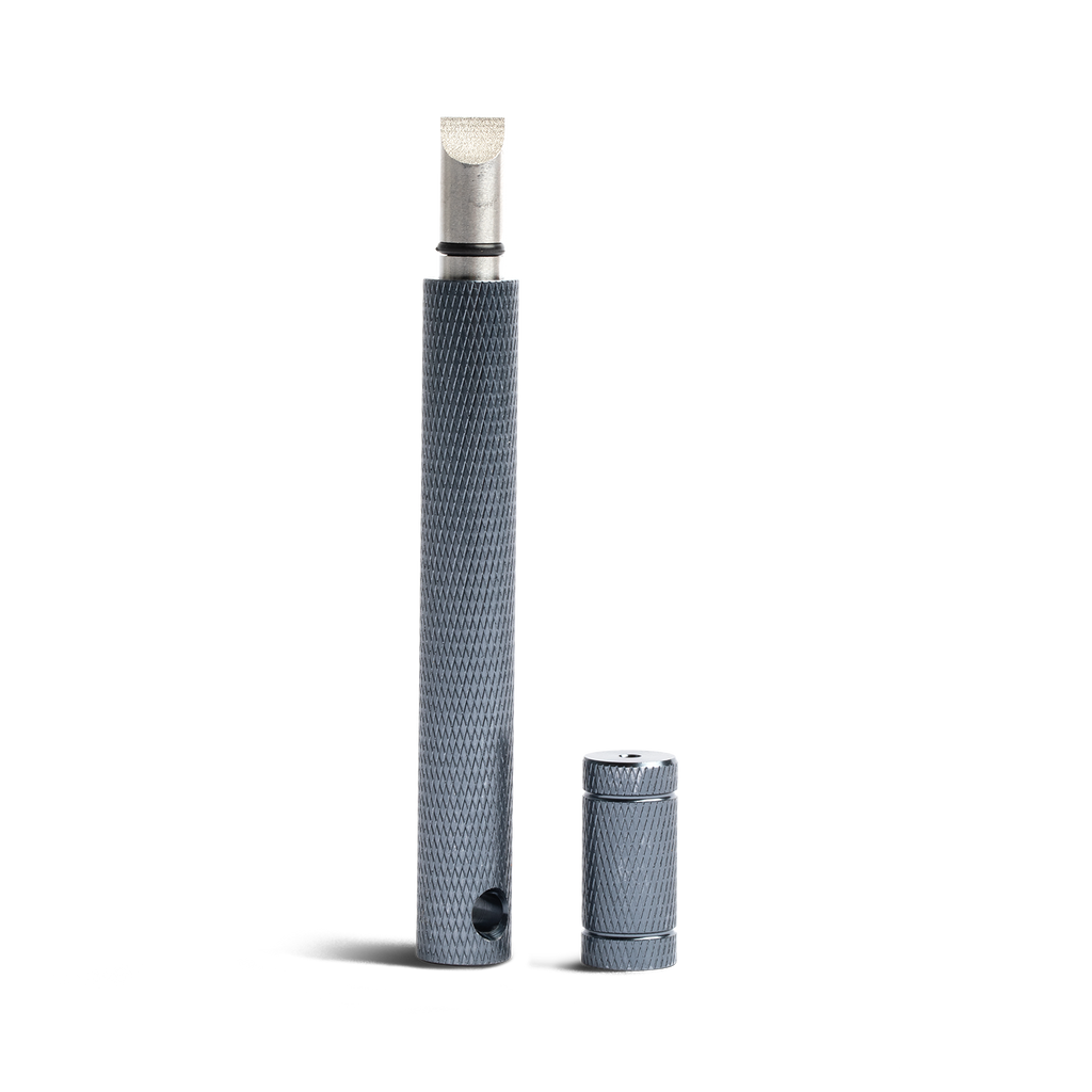 golf club groove sharpener in black with its protective top off