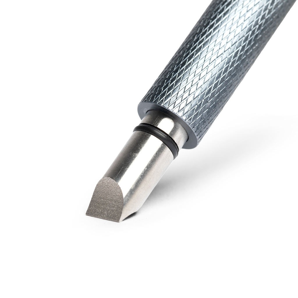 close up shot of golf club groove sharpener in black showing its sharp edges