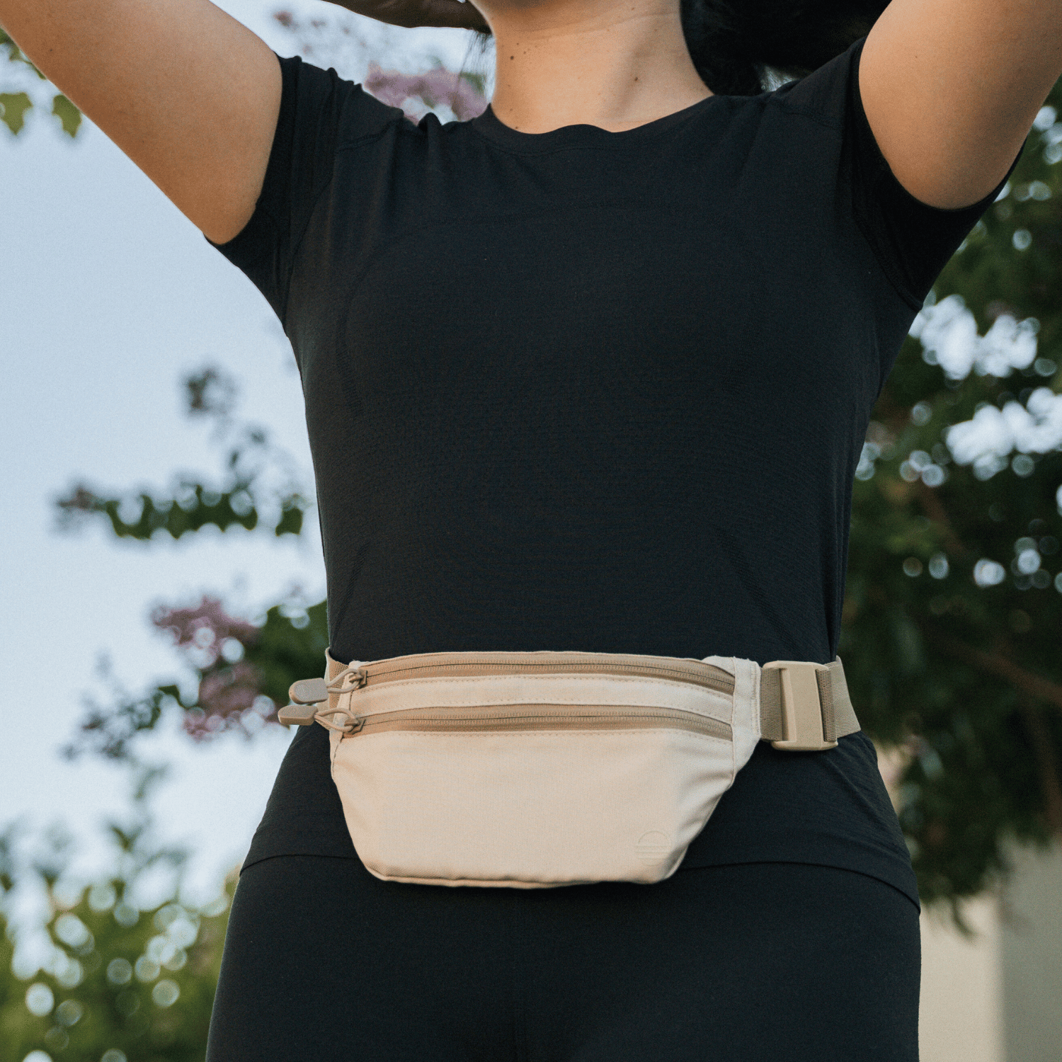 Toasted Almond Runner Sling won by a woman on her waist