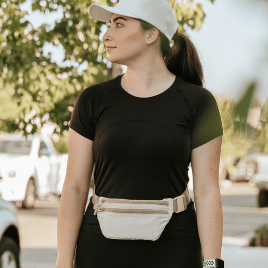Toasted Almond Runner Sling worn by a woman posing and looking away