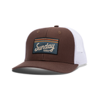 Front shot of brown and white trucker golf hat