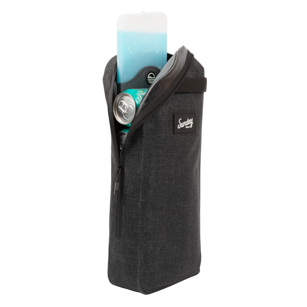 A front shot of welded waterproof big frosty golf cooler bag in charcoal unzipped showing an icepack and canned drinks inside
