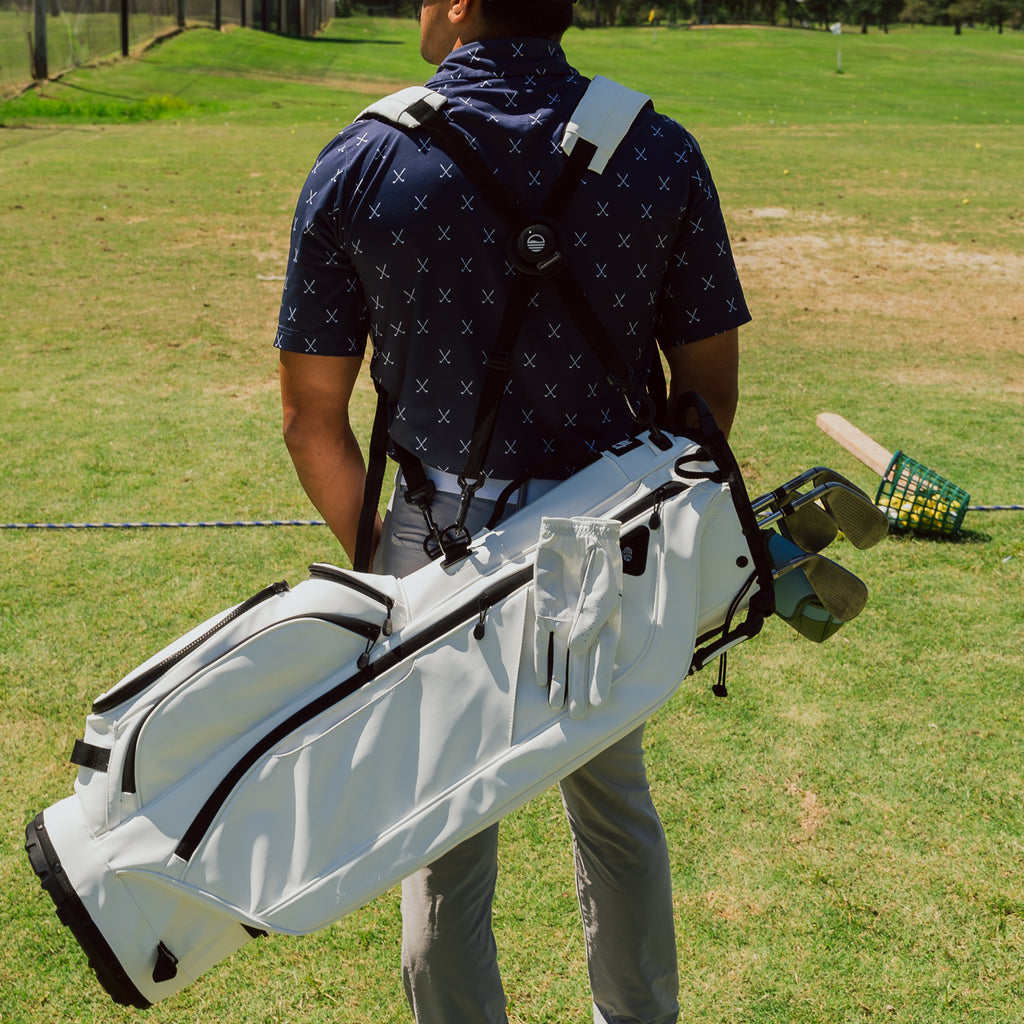 Back view of a man wearing the Ryder S-Class in white vegan leather with its double straps