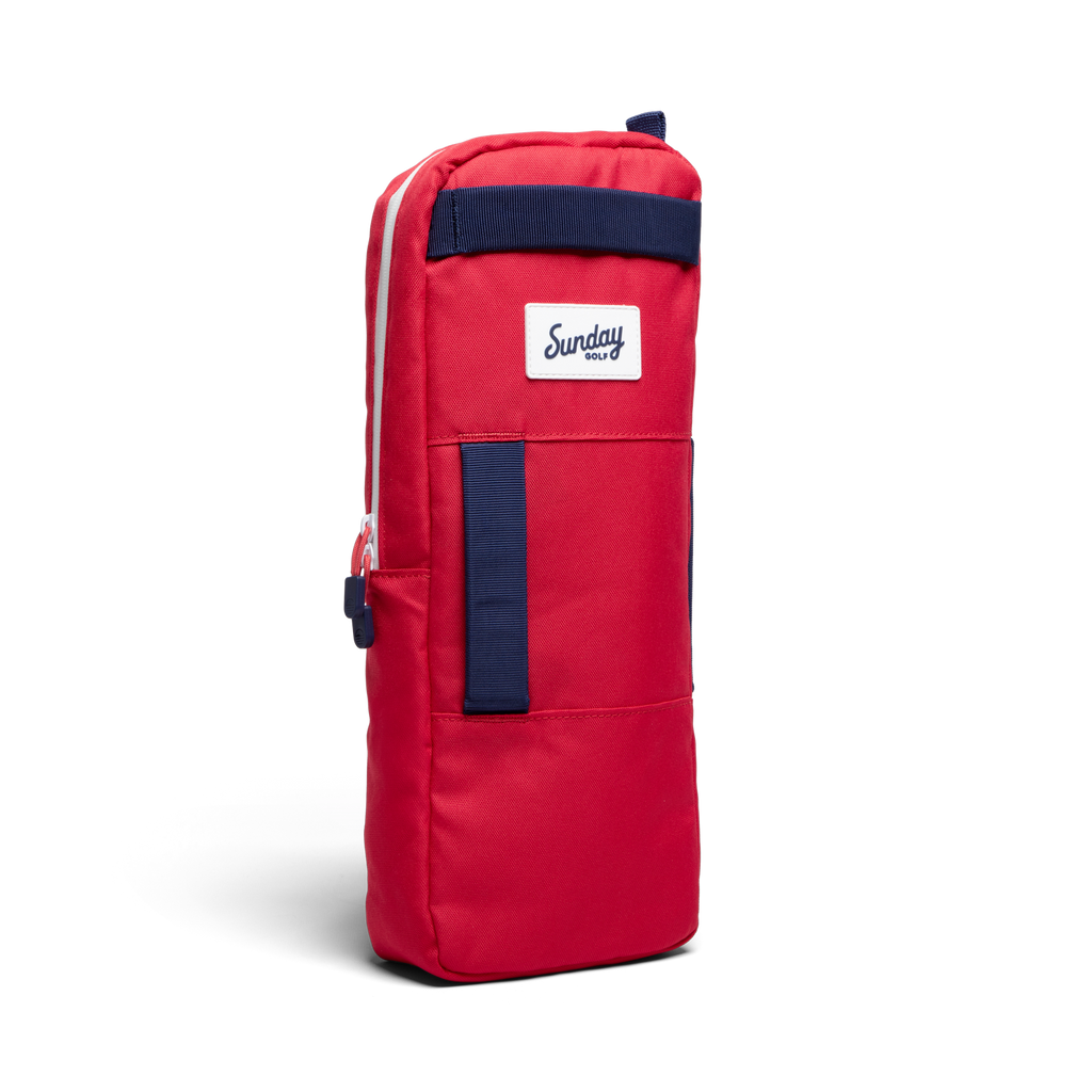 A front shot of big frosty golf cooler bag in red and blue fully zipped