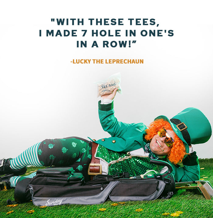 Lucky the Leprechaun holding a tee bag of golf bamboo tees