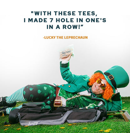 Lucky the Leprechaun holding a tee bag of golf bamboo tees