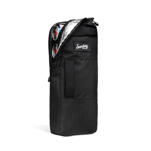 A front shot of big frosty golf cooler bag in matte black partially unzipped showing canned drinks inside