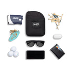 Matte black nickel bag valuables pouch laying flat with items it can hold 