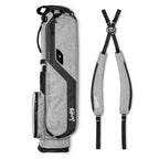 A full shot of El Camino golf bag in heather gray laying flat sideways beside its matching double strap
