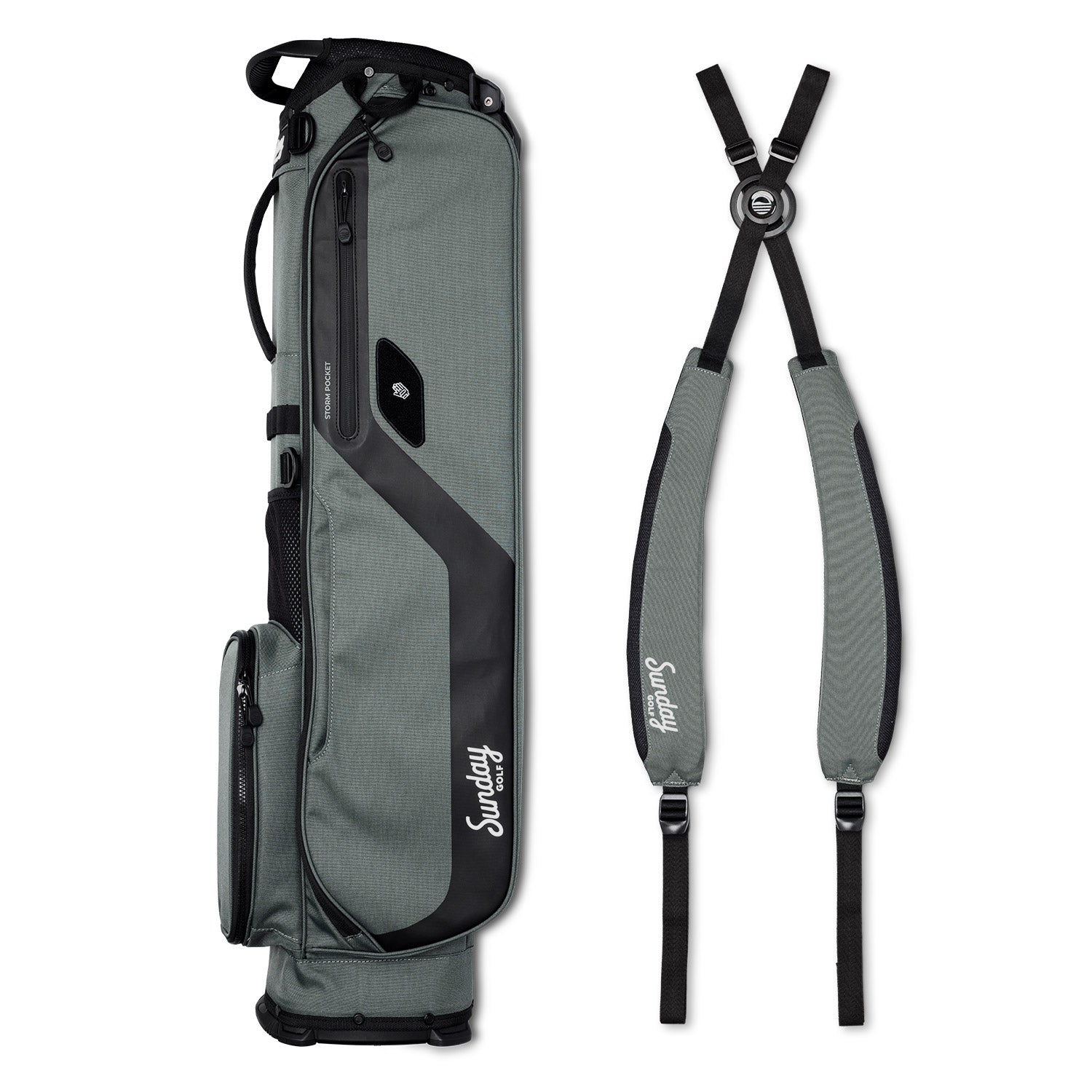 A full shot of El Camino golf bag in midnight green laying flat sideways beside its double strap