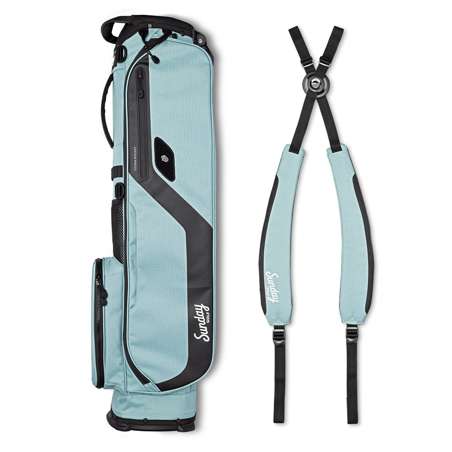 A full shot of El Camino golf bag in seafoam laying flat sideways beside its double strap