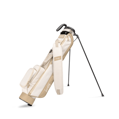 A full front shot of standing Loma golf bag in toasted almond with single strap