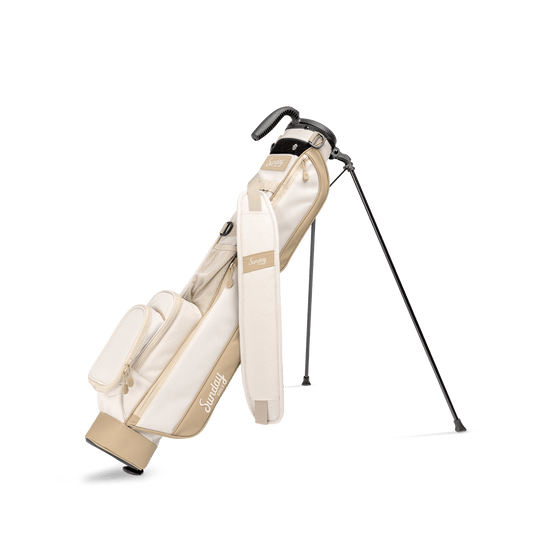 A full front shot of standing Loma golf bag in toasted almond with single strap