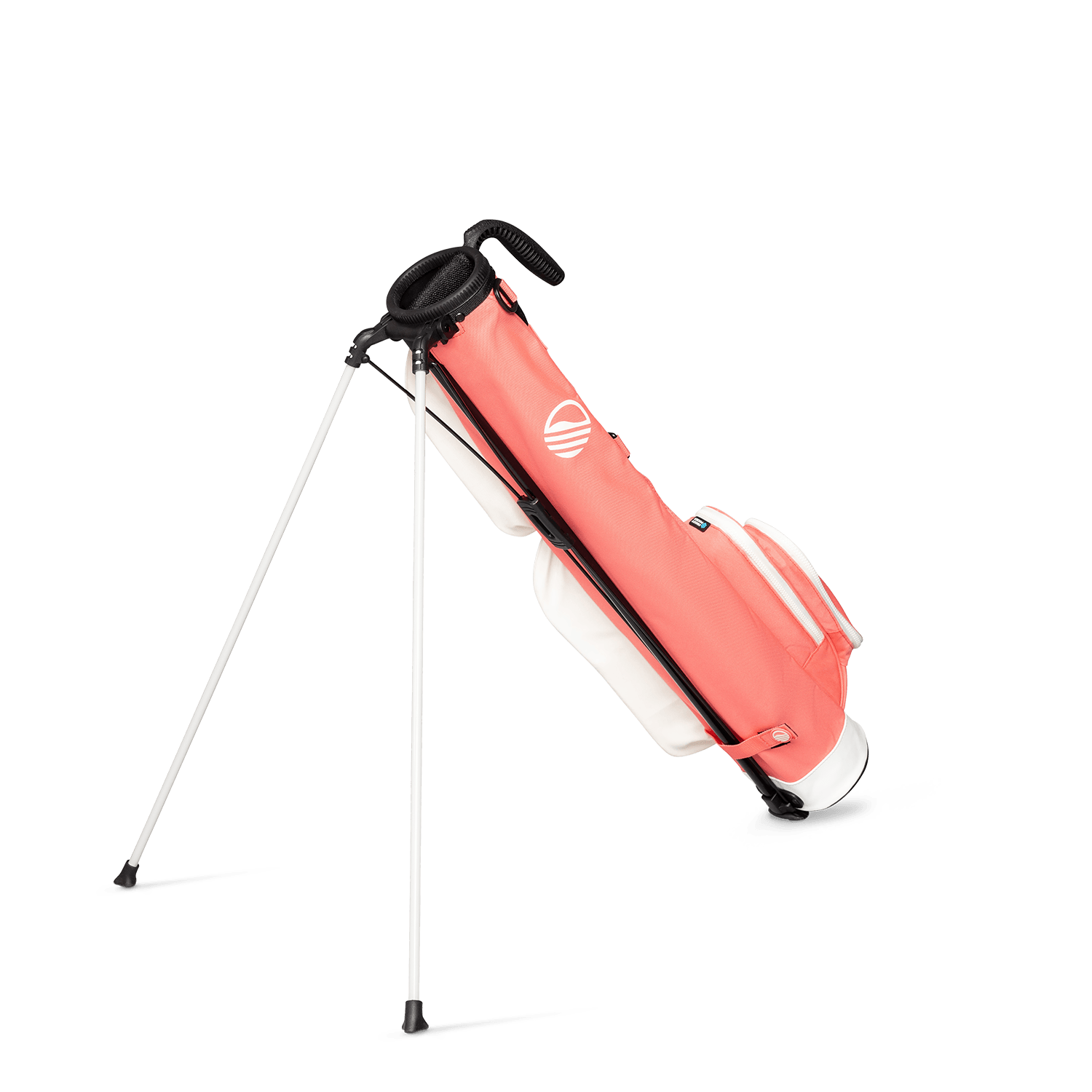 A full shot of standing Loma golf bag in coral facing backward