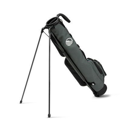 A full shot of standing Loma golf bag in midnight green facing backward