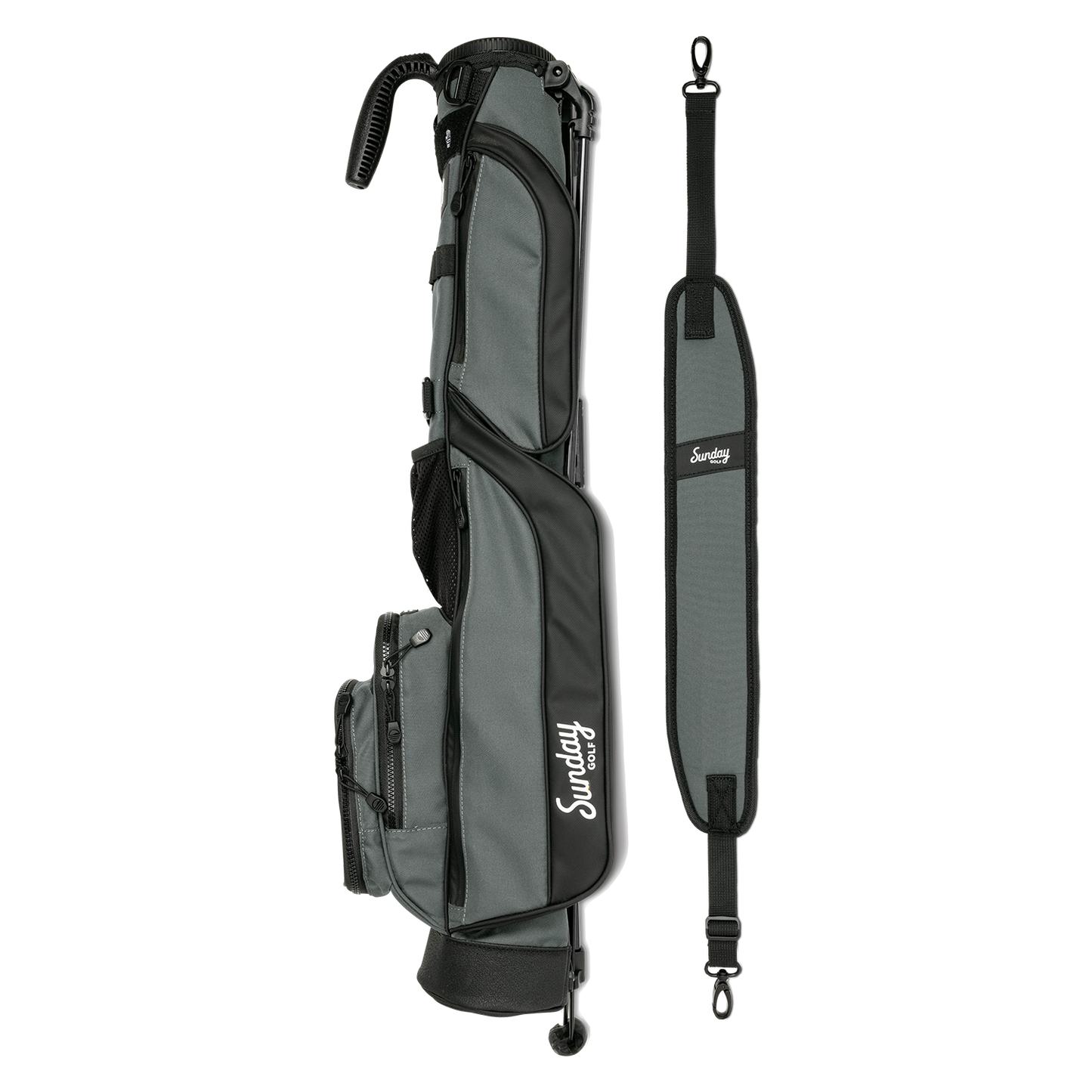 A full shot of Loma golf bag in midnight green laying flat sideways beside its single strap
