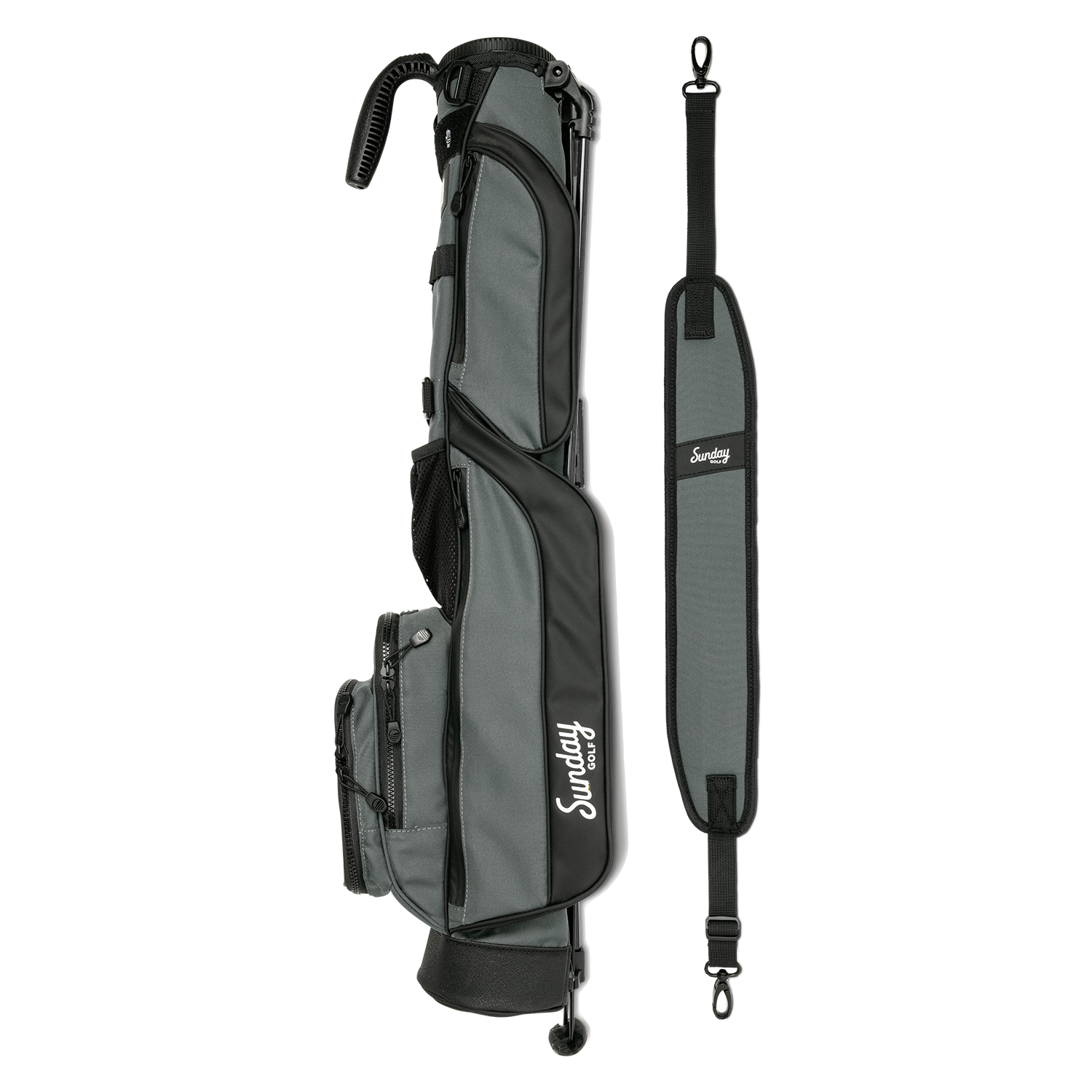 A full shot of Loma golf bag in midnight green laying flat sideways beside its single strap