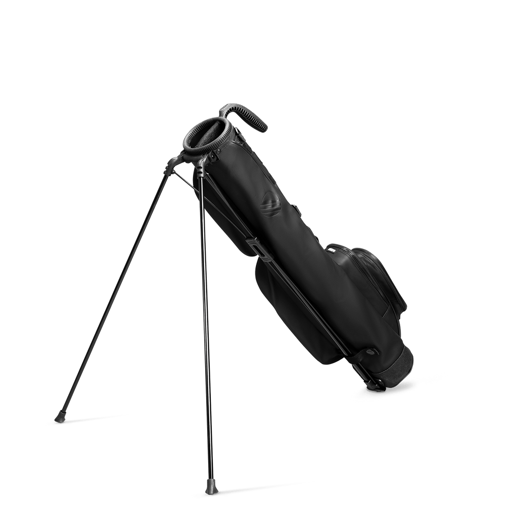 A full shot of standing Loma S-Class golf bag in black vegan leather facing backward