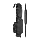 A full shot of Loma S-Class golf bag in black vegan leather laying flat sideways beside its single strap
