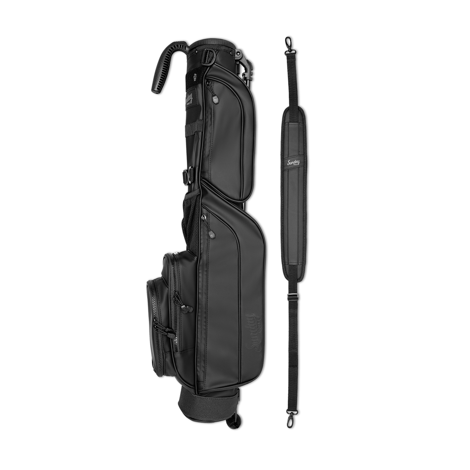 A full shot of Loma S-Class golf bag in black vegan leather laying flat sideways beside its single strap