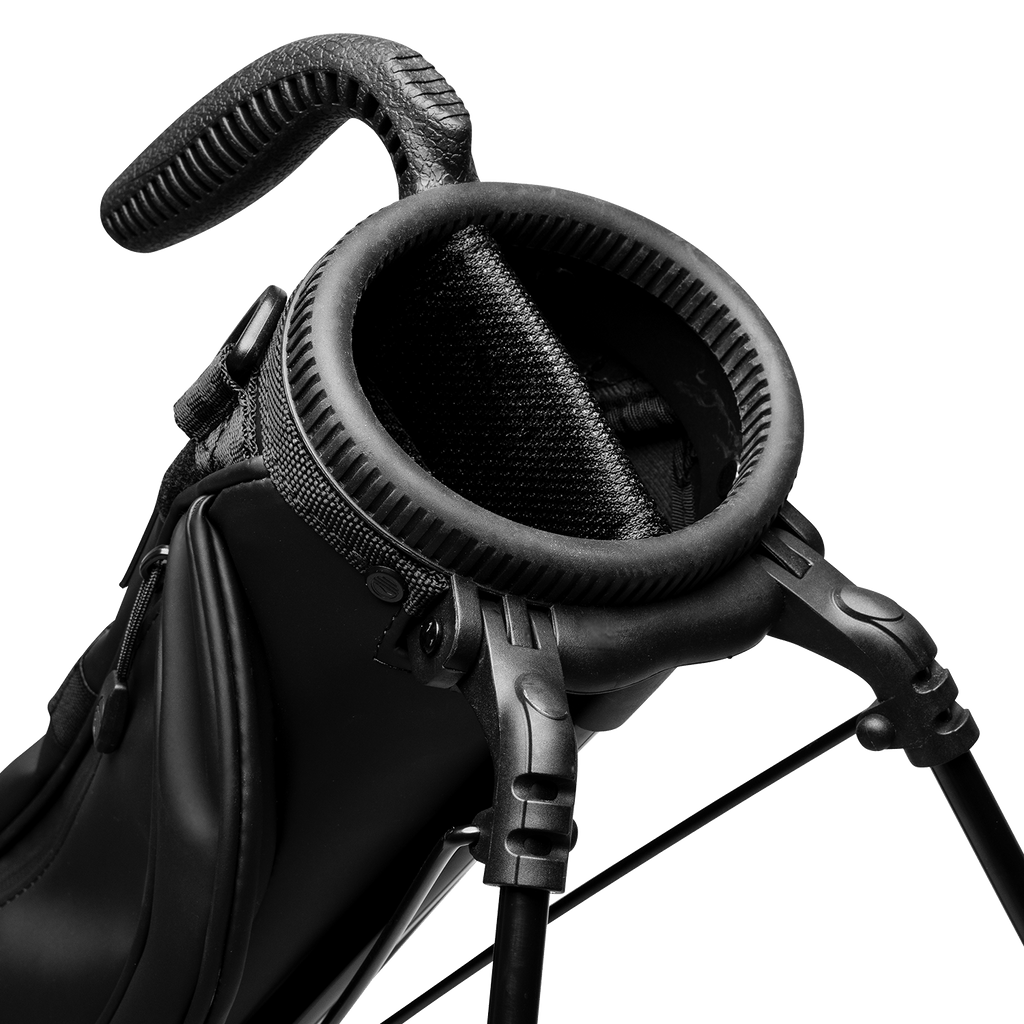 A close up top view of a black vegan leather Loma S-Class golf bag's full-length divider