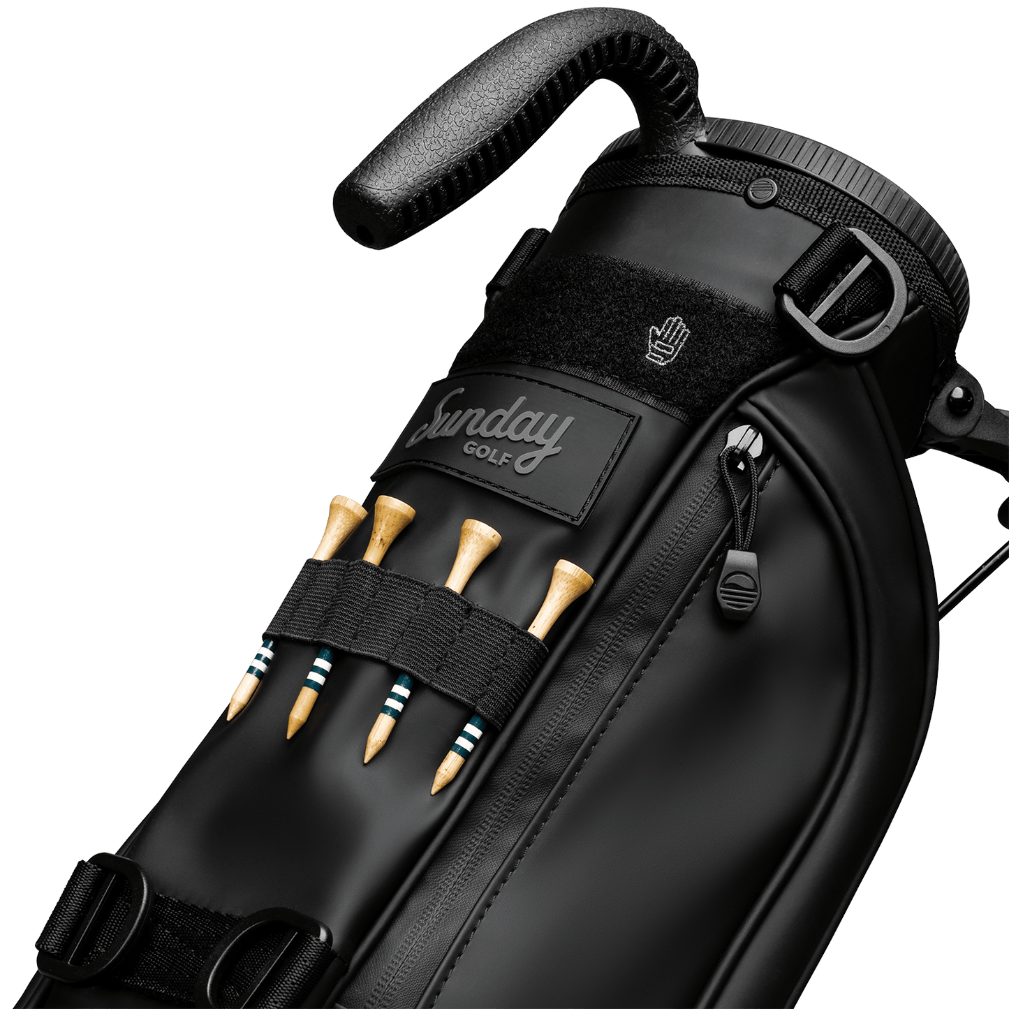 A close up of Loma S-Class golf bag in black vegan leather showing the front with bamboo golf tees