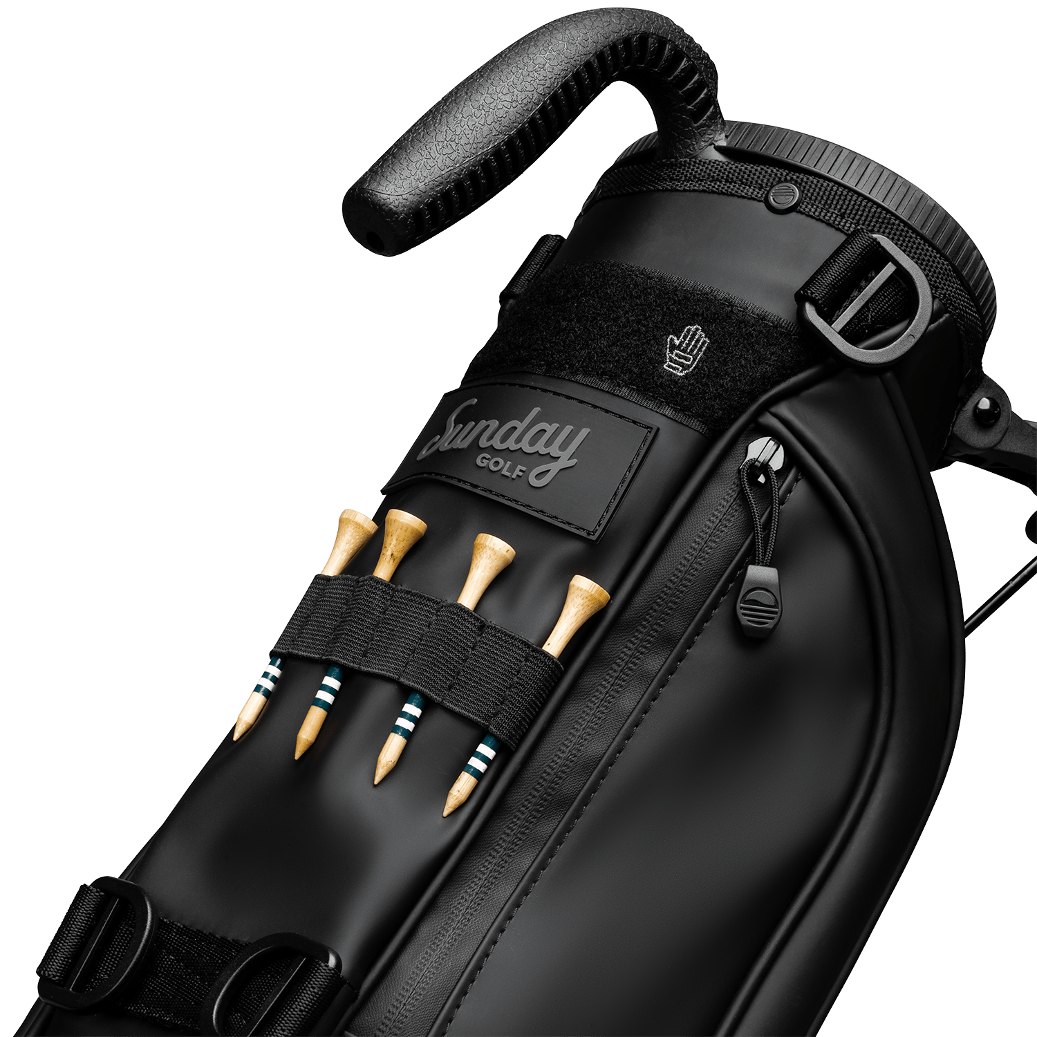 A close up of Loma S-Class golf bag in black vegan leather showing the front with bamboo golf tees