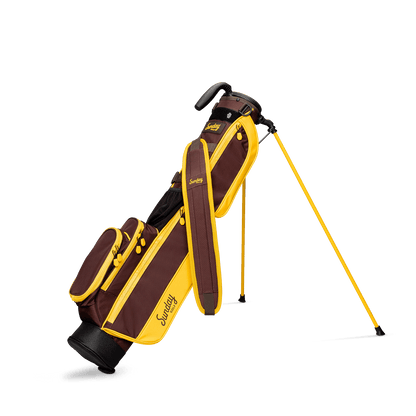 A full front shot of standing Loma golf bag in friars brown with single strap