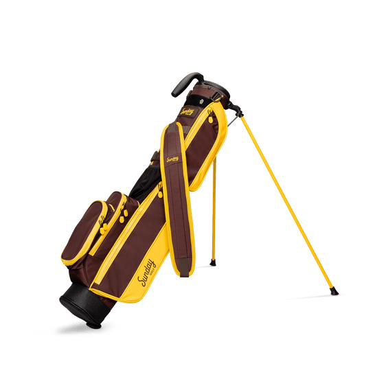 A full front shot of standing Loma golf bag in friars brown with single strap