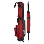 A full shot of Loma golf bag in ron burgundy laying flat sideways beside its single strap