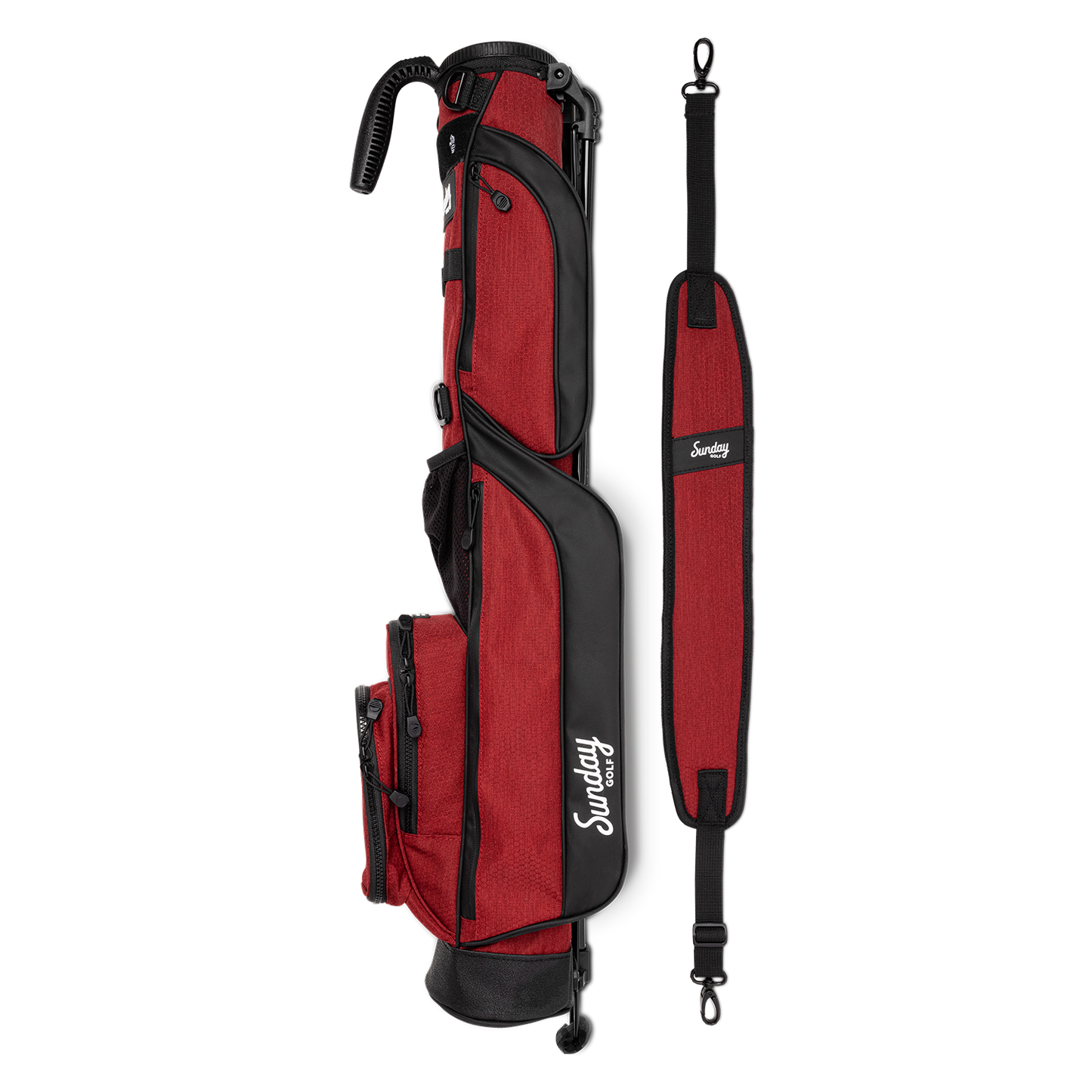 A full shot of Loma golf bag in ron burgundy laying flat sideways beside its single strap