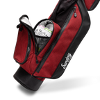 A close up shot of ron burgundy Loma golf bag's insulated pocket with canned drinks inside