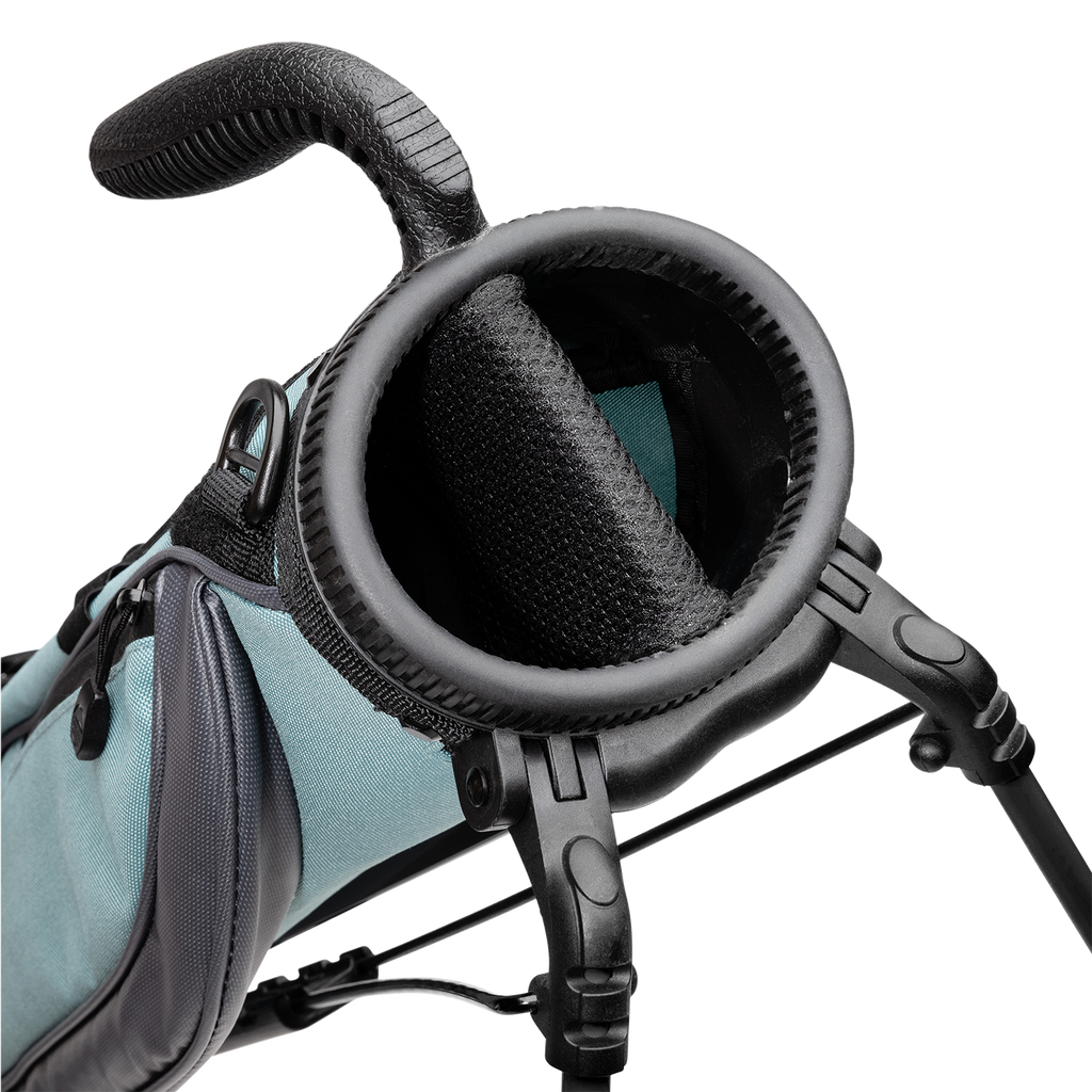 A close up top view of a seafoam Loma golf bag’s 2-way divider