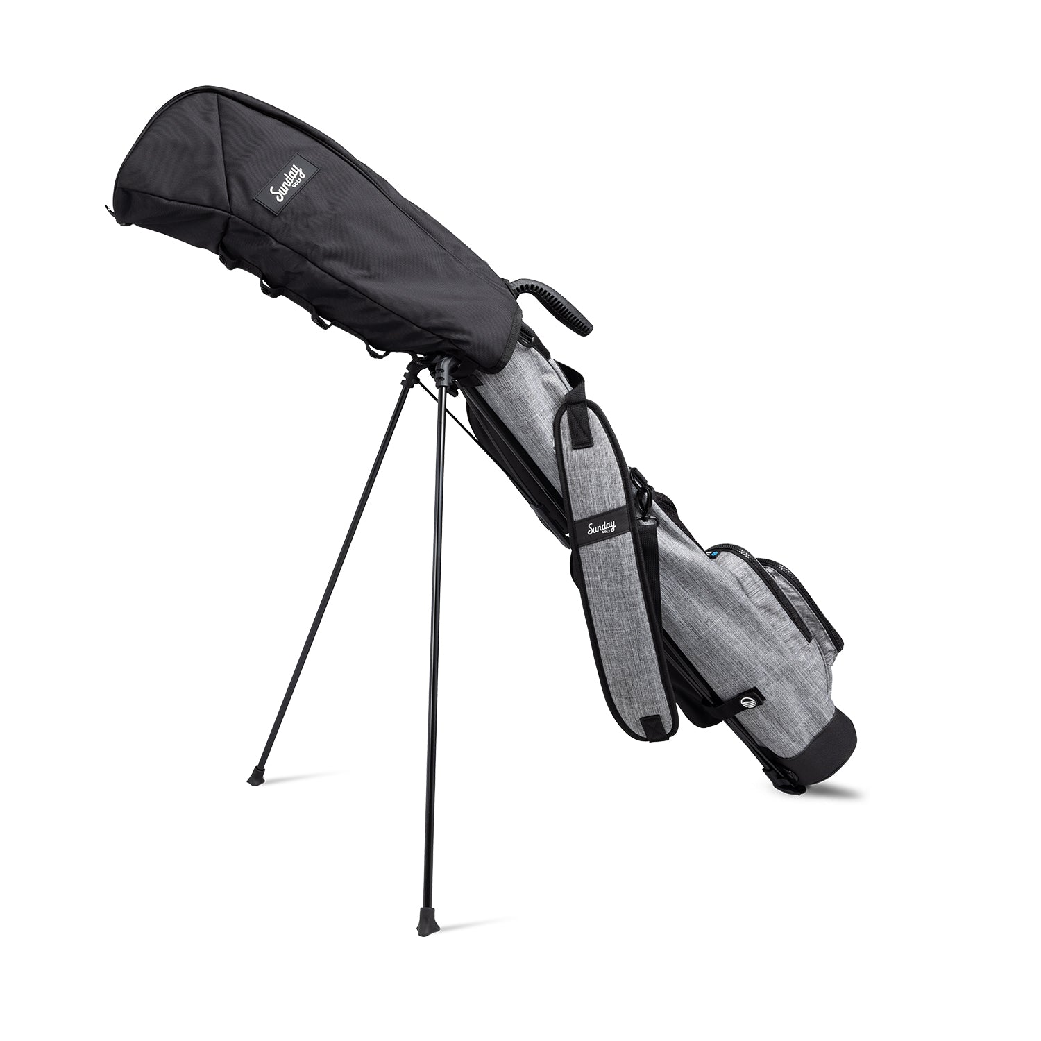 Heather gray Loma golf bag being fitted inside matte black rain hood 