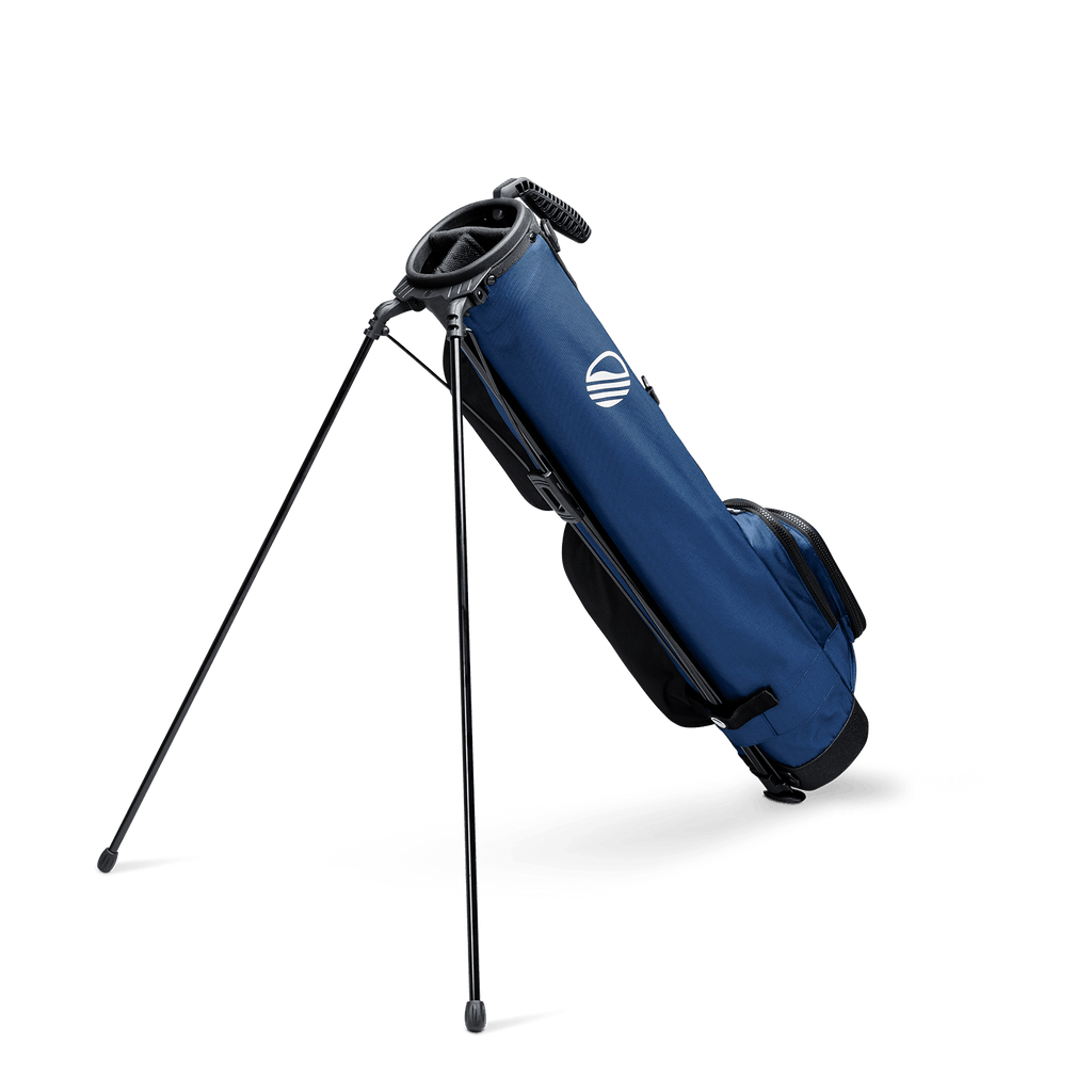 A full shot of standing Loma XL golf bag in cobalt blue facing backward