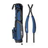 A full shot of Loma XL golf bag in cobalt blue laying flat sideways beside its double strap