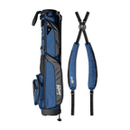 A full shot of Loma XL golf bag in cobalt blue laying flat sideways beside its double strap