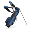 A full front shot of standing Loma XL golf bag in cobalt blue with double strap