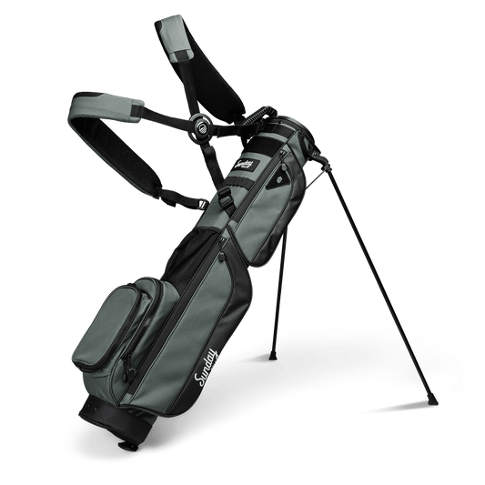 A full front shot of standing Loma XL golf bag in midnight green with double strap